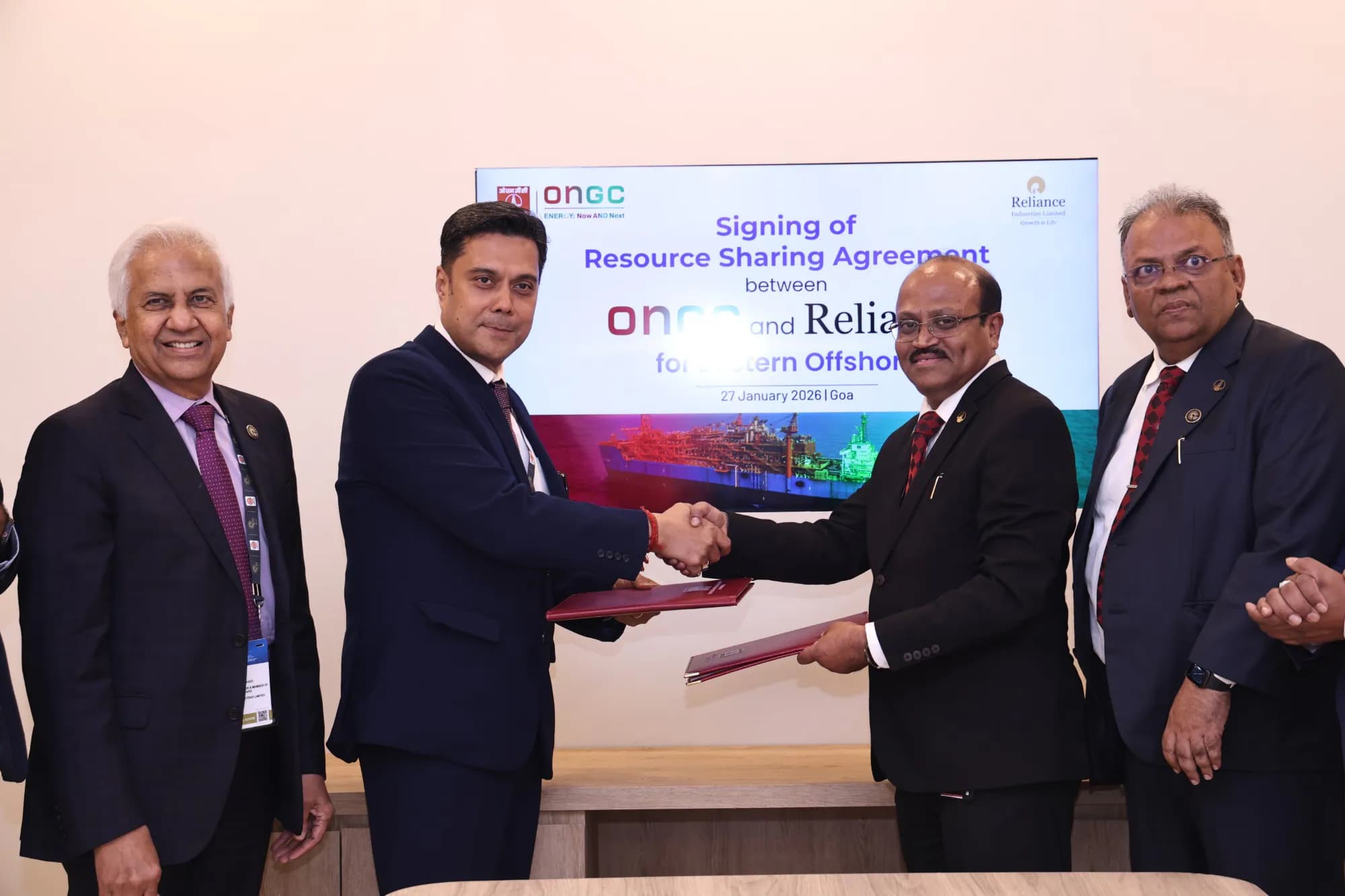 ONGC and Reliance signing a resource sharing agreement at India Energy Club
